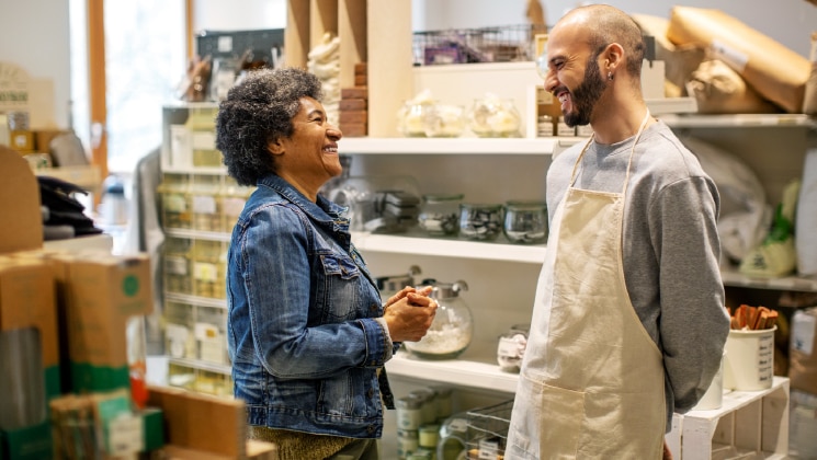 Business owner talking to a customer