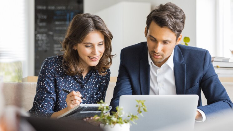 Two people at a business meeting