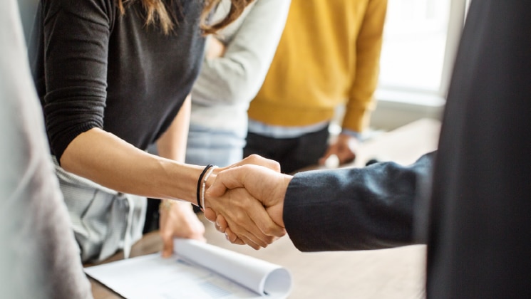 Two people shaking hands