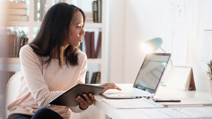 Woman looking at computer